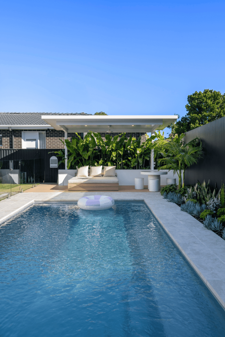 Luxe Cantilever pergola at the end of a lap pool