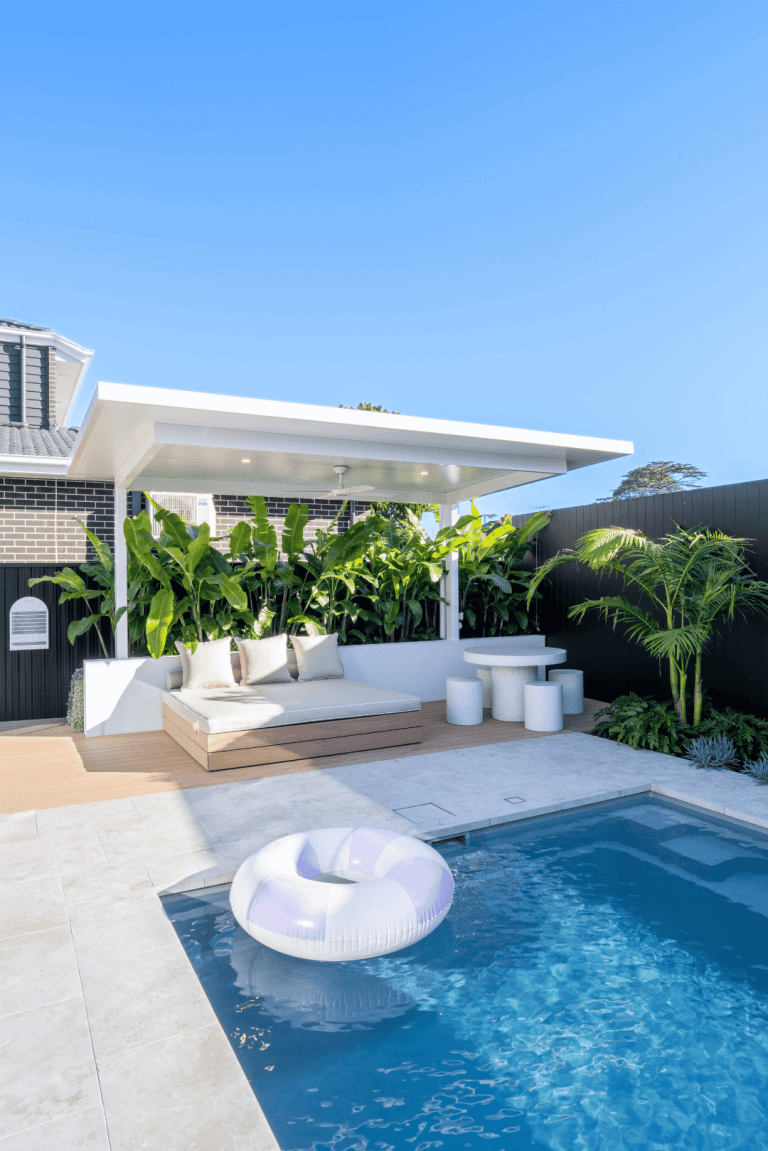 Luxe Cantilever pergola over a poolside lounge