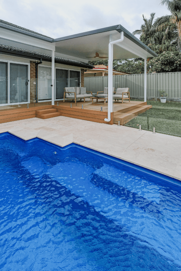 Pool with decking and a covered entertaining area