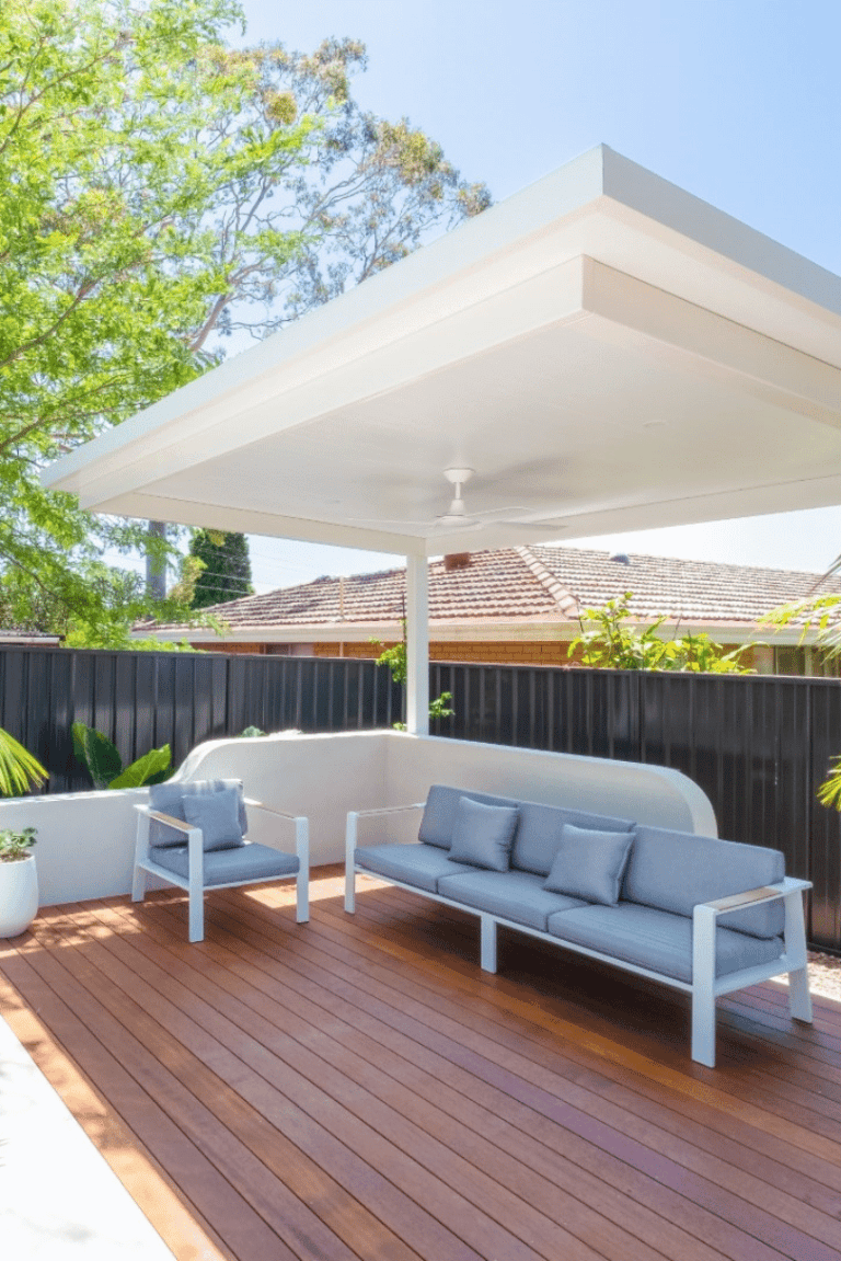 Hardwood deck with outdoor lounge under a pergola